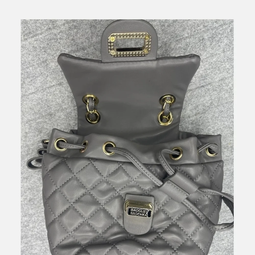 Badgely Mischka quilted mini  backpack, gray with gold tone hardware NWT